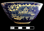 Pearlware London shape bowl printed underglaze in medium blue with pastoral scene.  Same scene on both sides of bowl.  Continuous repeating floral border. 6.5” rim diameter; 3” vessel height.
